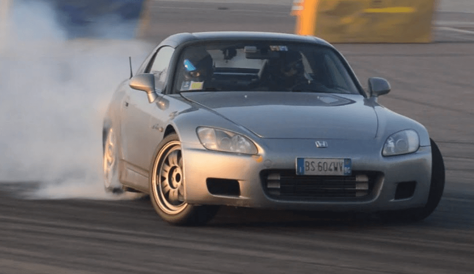 Honda S2000 drifting on professional track