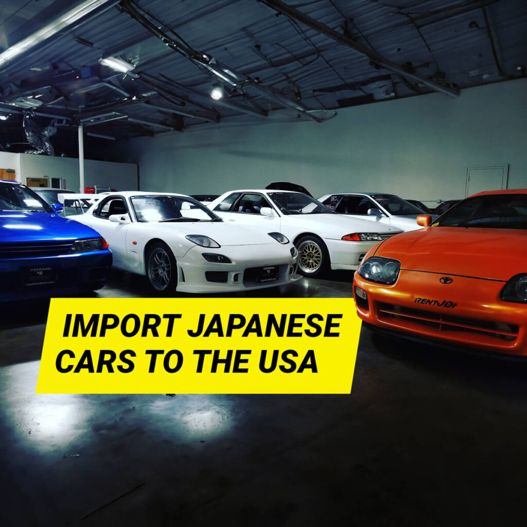 JDM cars in a garage waiting to be imported