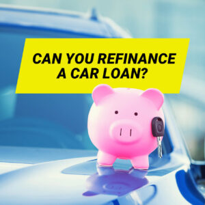 Piggy Bank sitting on car with a sign saying Can You Refinance a Car Loan?