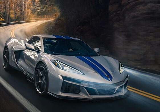 2024 CORVETTE E-RAY driving down the road