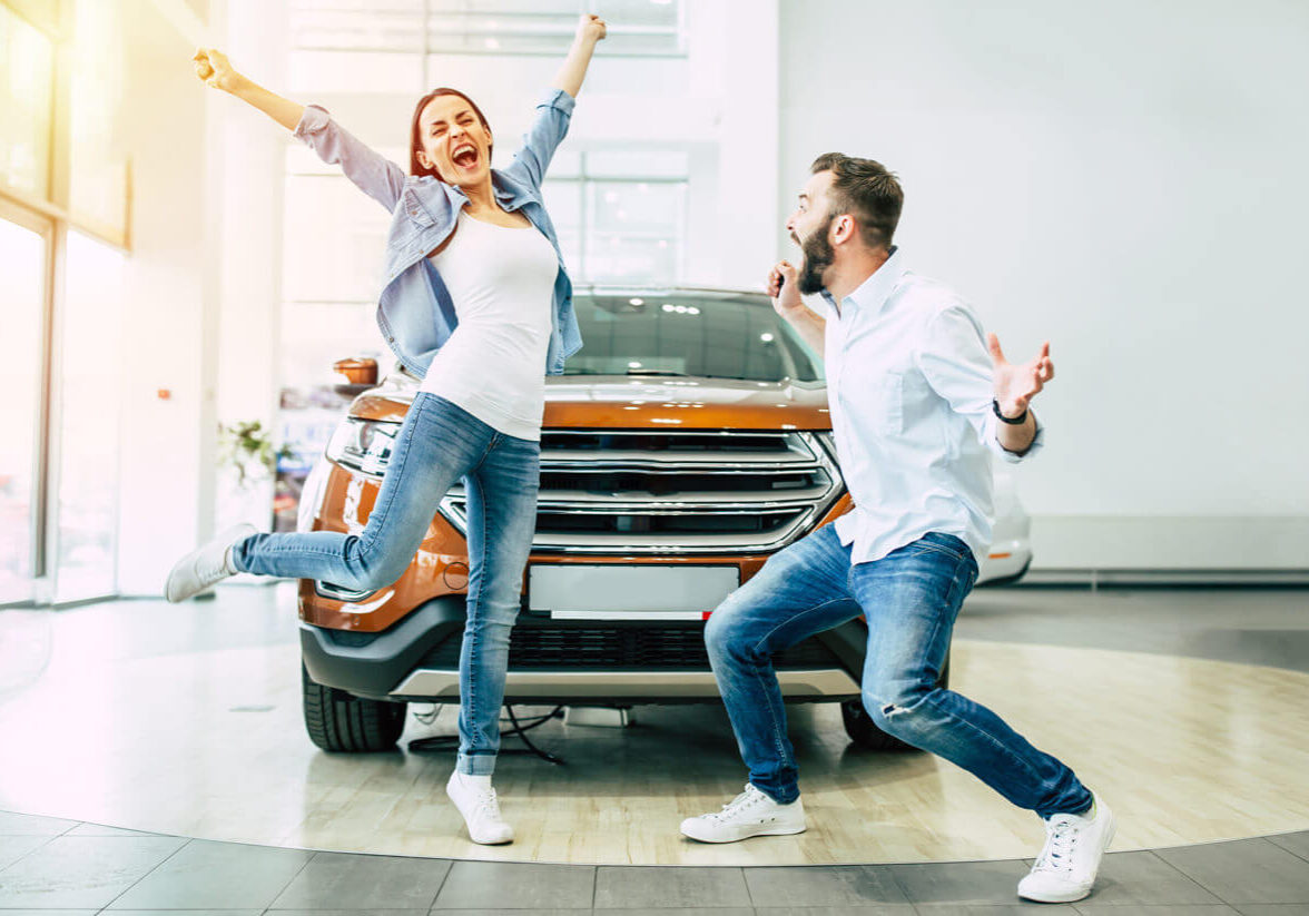 Husband and Wife happy they bought a car with bad credit