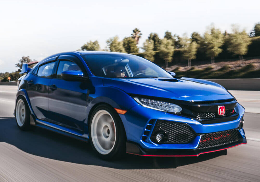 Blue Civic Type R driving down the road